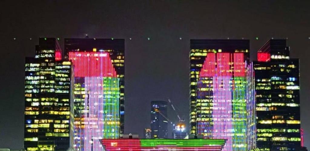 الامارات الان | معالم الإمارات ومبانيها تزدان بالعلم رمز عزّتها وشموخها | عيون الجزيرة الامارات